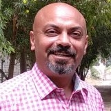 Chemistry professor conducting laboratory research